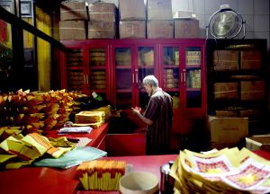 An Elderly Man in the Chinese Temple Shop 